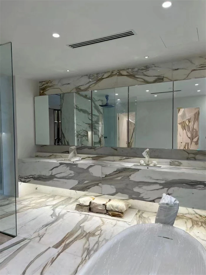 Calacatta Gold Marble Tile Shower